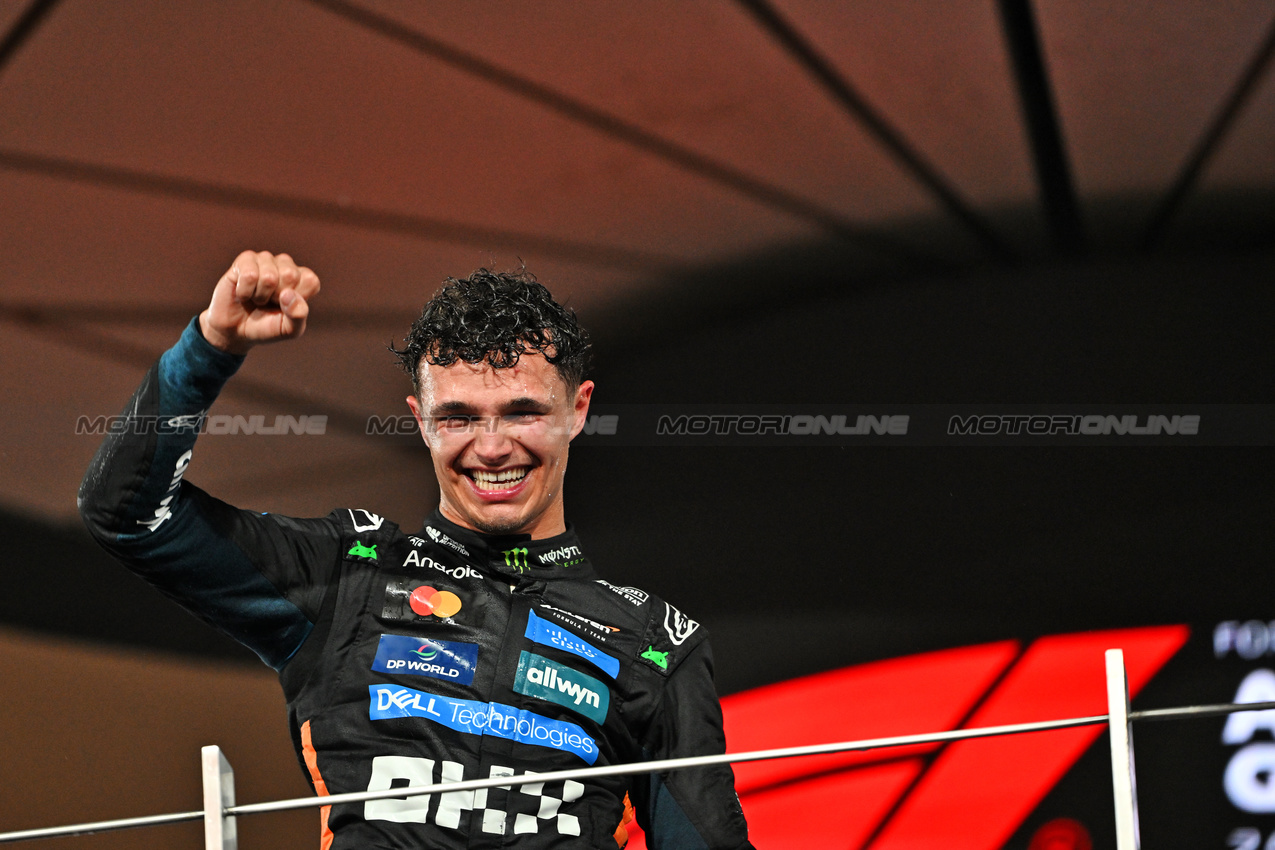 GP ABU DHABI, Third placed World Champion Lando Norris (GBR) McLaren celebrates on the podium.

07.12.2025. Formula 1 World Championship, Rd 24, Abu Dhabi Grand Prix, Yas Marina Circuit, Abu Dhabi, Gara Day.

- www.xpbimages.com, EMail: requests@xpbimages.com © Copyright: Price / XPB Images