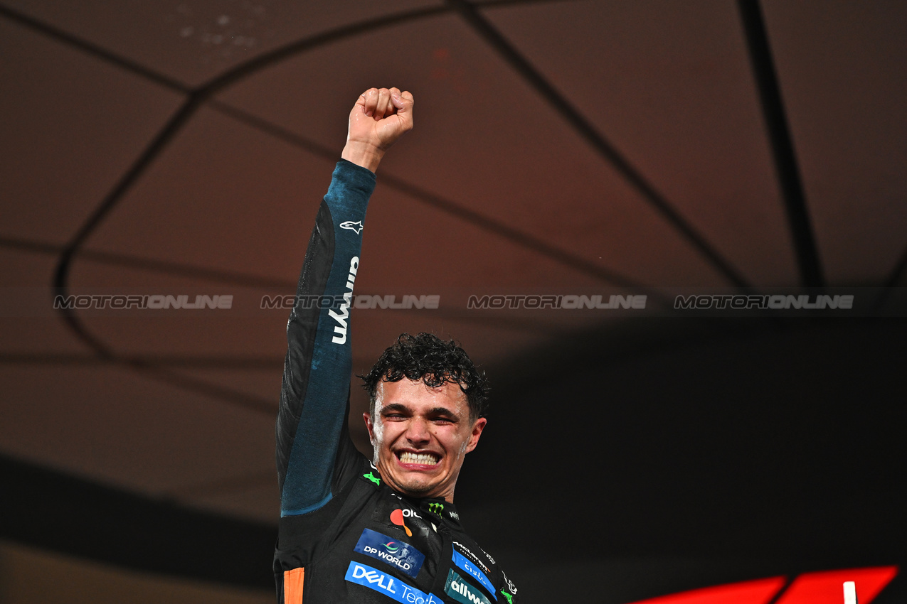 GP ABU DHABI, Third placed World Champion Lando Norris (GBR) McLaren celebrates on the podium.

07.12.2025. Formula 1 World Championship, Rd 24, Abu Dhabi Grand Prix, Yas Marina Circuit, Abu Dhabi, Gara Day.

- www.xpbimages.com, EMail: requests@xpbimages.com © Copyright: Price / XPB Images