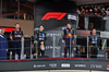 GP ABU DHABI, The podium (L to R): Richard Wolverson (GBR) Red Bull Racing Head of Gara Team Operations; Oscar Piastri (AUS) McLaren, second; Max Verstappen (NLD) Red Bull Racing, vincitore; Lando Norris (GBR) McLaren, third.

07.12.2025. Formula 1 World Championship, Rd 24, Abu Dhabi Grand Prix, Yas Marina Circuit, Abu Dhabi, Gara Day.

- www.xpbimages.com, EMail: requests@xpbimages.com © Copyright: Moy / XPB Images