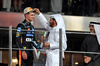 GP ABU DHABI, (L to R): Third placed World Champion Lando Norris (GBR) McLaren on the podium with Mohammed Bin Sulayem (UAE) FIA President.

07.12.2025. Formula 1 World Championship, Rd 24, Abu Dhabi Grand Prix, Yas Marina Circuit, Abu Dhabi, Gara Day.

- www.xpbimages.com, EMail: requests@xpbimages.com © Copyright: Moy / XPB Images
