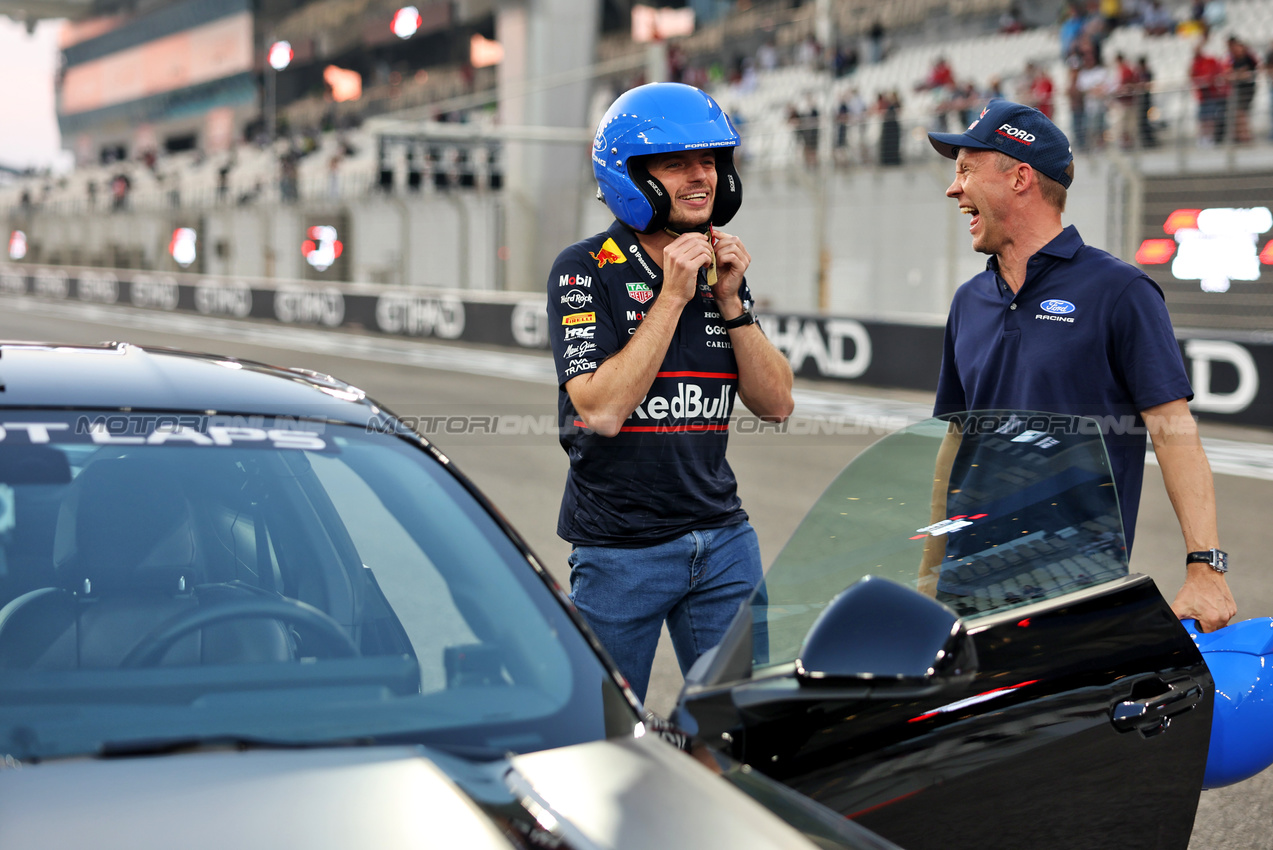 GP ABU DHABI, Max Verstappen (NLD) Red Bull Racing - Pirelli Hot Laps with a Ford Mustang.

04.12.2025. Formula 1 World Championship, Rd 24, Abu Dhabi Grand Prix, Yas Marina Circuit, Abu Dhabi, Preparation Day.

- www.xpbimages.com, EMail: requests@xpbimages.com © Copyright: Bearne / XPB Images