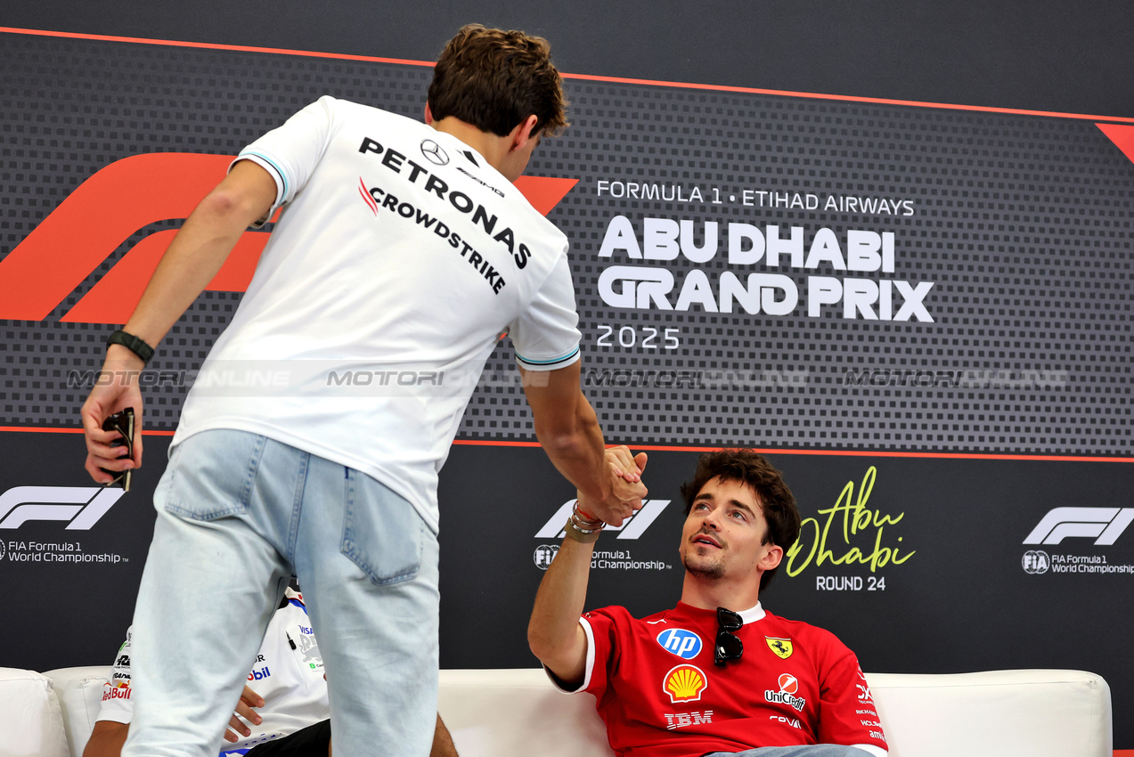GP ABU DHABI, (L to R): George Russell (GBR) Mercedes AMG F1 e Charles Leclerc (MON) Ferrari in the FIA Press Conference.

04.12.2025. Formula 1 World Championship, Rd 24, Abu Dhabi Grand Prix, Yas Marina Circuit, Abu Dhabi, Preparation Day.

- www.xpbimages.com, EMail: requests@xpbimages.com © Copyright: Bearne / XPB Images