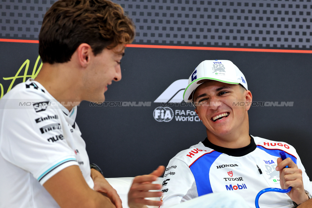 GP ABU DHABI, (L to R): George Russell (GBR) Mercedes AMG F1 e Isack Hadjar (FRA) Racing Bulls in the FIA Press Conference.

04.12.2025. Formula 1 World Championship, Rd 24, Abu Dhabi Grand Prix, Yas Marina Circuit, Abu Dhabi, Preparation Day.

- www.xpbimages.com, EMail: requests@xpbimages.com © Copyright: Bearne / XPB Images