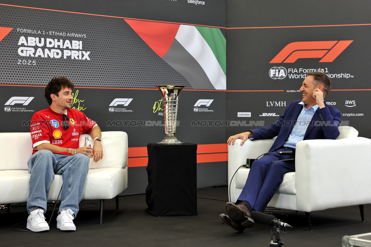 GP ABU DHABI, (L to R): Charles Leclerc (MON) Ferrari with Tom Clarkson (GBR) Journalist in the FIA Press Conference.

04.12.2025. Formula 1 World Championship, Rd 24, Abu Dhabi Grand Prix, Yas Marina Circuit, Abu Dhabi, Preparation Day.

- www.xpbimages.com, EMail: requests@xpbimages.com © Copyright: Bearne / XPB Images
