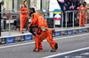 GP ABU DHABI, Marshals clear debris from the pitlane collision involving Yuki Tsunoda (JPN) Red Bull Racing RB21 e Andrea Kimi Antonelli (ITA) Mercedes AMG F1 W16 in the third practice session.
06.12.2025. Formula 1 World Championship, Rd 24, Abu Dhabi Grand Prix, Yas Marina Circuit, Abu Dhabi, Qualifiche Day.
- www.xpbimages.com, EMail: requests@xpbimages.com © Copyright: Batchelor / XPB Images
