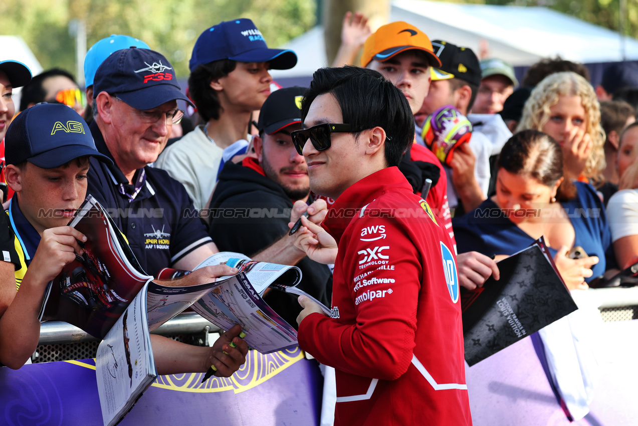 GP AUSTRALIA, Zhou Guanyu (CHN) Ferrari Reserve Driver with fans.

14.03.2025. Formula 1 World Championship, Rd 1, Australian Grand Prix, Albert Park, Melbourne, Australia, Practice Day.

- www.xpbimages.com, EMail: requests@xpbimages.com © Copyright: Moy / XPB Images