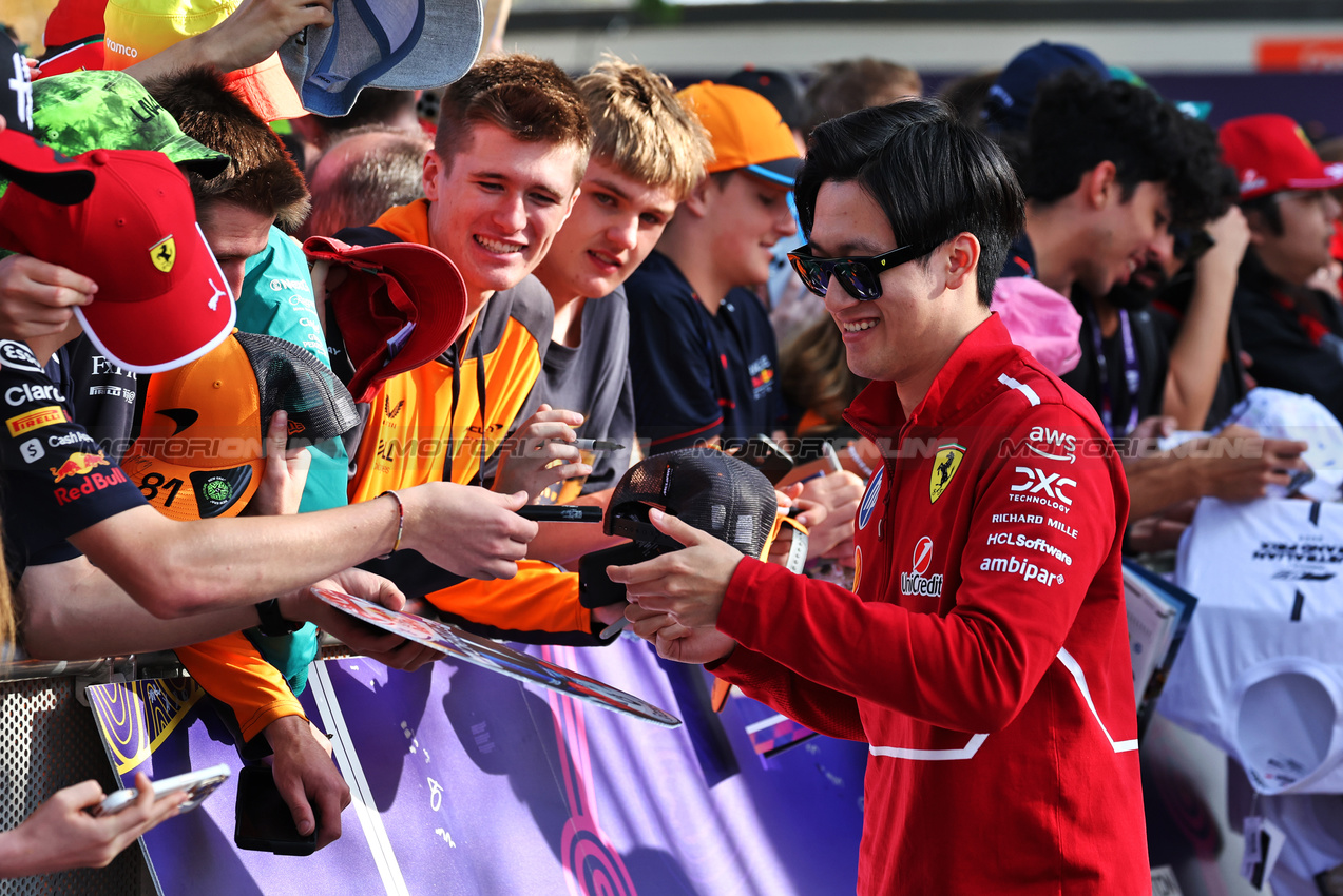 GP AUSTRALIA, Zhou Guanyu (CHN) Ferrari Reserve Driver with fans.

14.03.2025. Formula 1 World Championship, Rd 1, Australian Grand Prix, Albert Park, Melbourne, Australia, Practice Day.

- www.xpbimages.com, EMail: requests@xpbimages.com © Copyright: Moy / XPB Images