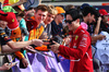 GP AUSTRALIA, Zhou Guanyu (CHN) Ferrari Reserve Driver with fans.

14.03.2025. Formula 1 World Championship, Rd 1, Australian Grand Prix, Albert Park, Melbourne, Australia, Practice Day.

- www.xpbimages.com, EMail: requests@xpbimages.com © Copyright: Moy / XPB Images