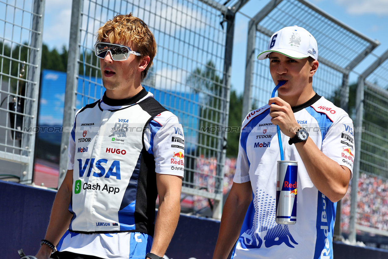 GP AUSTRIA, (L to R): Liam Lawson (NZL) Racing Bulls e Isack Hadjar (FRA) Racing Bulls on the drivers' parade.

29.06.2025. Formula 1 World Championship, Rd 11, Austrian Grand Prix, Spielberg, Austria, Gara Day.

- www.xpbimages.com, EMail: requests@xpbimages.com © Copyright: Moy / XPB Images