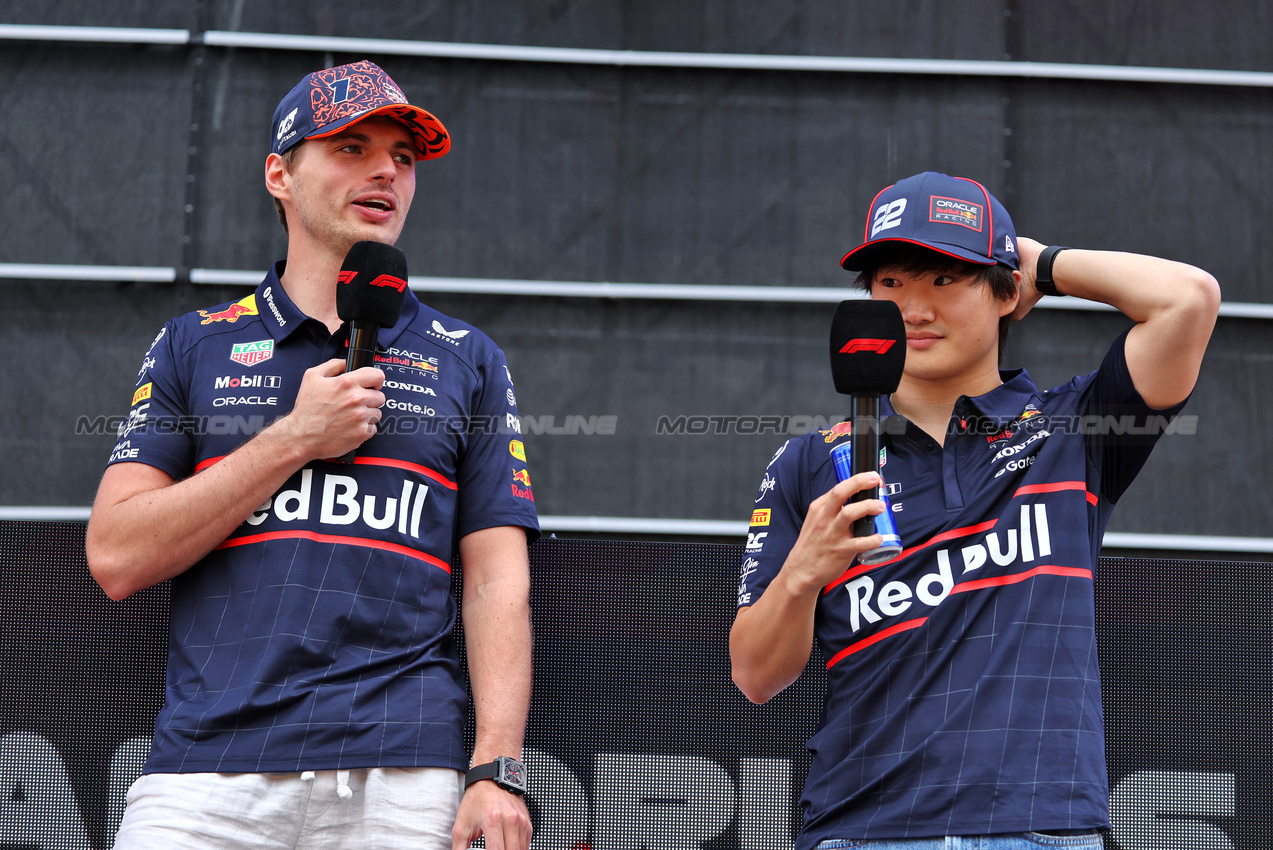 GP AUSTRIA, (L to R): Max Verstappen (NLD) Red Bull Racing e Yuki Tsunoda (JPN) Red Bull Racing on the FanZone Stage.

28.06.2025. Formula 1 World Championship, Rd 11, Austrian Grand Prix, Spielberg, Austria, Qualifiche Day.

- www.xpbimages.com, EMail: requests@xpbimages.com © Copyright: Moy / XPB Images