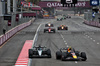 GP AZERBAIJAN, George Russell (GBR) Mercedes AMG F1 W16 e Yuki Tsunoda (JPN) Red Bull Racing RB21 battle for position.

21.09.2025. Formula 1 World Championship, Rd 17, Azerbaijan Grand Prix, Baku Street Circuit, Azerbaijan, Gara Day.

- www.xpbimages.com, EMail: requests@xpbimages.com © Copyright: Batchelor / XPB Images