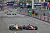 GP AZERBAIJAN, Isack Hadjar (FRA) Racing Bulls VCARB 02 e Lewis Hamilton (GBR) Ferrari SF-25 battle for position.

21.09.2025. Formula 1 World Championship, Rd 17, Azerbaijan Grand Prix, Baku Street Circuit, Azerbaijan, Gara Day.

- www.xpbimages.com, EMail: requests@xpbimages.com © Copyright: Batchelor / XPB Images
