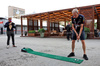 GP AZERBAIJAN, Mark Thompson (GBR) Photographer plays golf in the paddock.

18.09.2025. Formula 1 World Championship, Rd 17, Azerbaijan Grand Prix, Baku Street Circuit, Azerbaijan, Preparation Day.

 - www.xpbimages.com, EMail: requests@xpbimages.com © Copyright: Rew / XPB Images