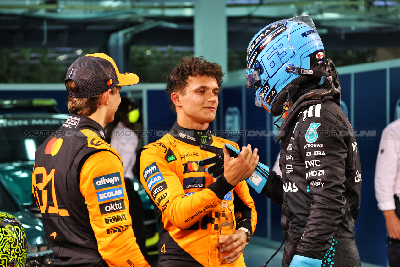 GP BAHRAIN, (L to R): Gara winner Oscar Piastri (AUS) McLaren with third placed Lando Norris (GBR) McLaren e second placed George Russell (GBR) Mercedes AMG F1 in parc ferme.

13.04.2025. Formula 1 World Championship, Rd 4, Bahrain Grand Prix, Sakhir, Bahrain, Gara Day.

- www.xpbimages.com, EMail: requests@xpbimages.com © Copyright: Batchelor / XPB Images