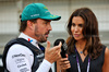 GP BAHRAIN, Fernando Alonso (ESP) Aston Martin F1 Team with Domenica Melissa Jimenez Dionisio (ESP) DAZN Presenter, on the grid.

13.04.2025. Formula 1 World Championship, Rd 4, Bahrain Grand Prix, Sakhir, Bahrain, Gara Day.

- www.xpbimages.com, EMail: requests@xpbimages.com © Copyright: Batchelor / XPB Images