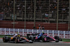 GP BAHRAIN, Lewis Hamilton (GBR) Ferrari SF-25 e Jack Doohan (AUS) Alpine F1 Team A525 battle for position.

13.04.2025. Formula 1 World Championship, Rd 4, Bahrain Grand Prix, Sakhir, Bahrain, Gara Day.

- www.xpbimages.com, EMail: requests@xpbimages.com © Copyright: Batchelor / XPB Images