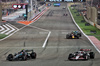 GP BAHRAIN, Andrea Kimi Antonelli (ITA) Mercedes AMG F1 W16 e Esteban Ocon (FRA) Haas VF-25 battle for position.

13.04.2025. Formula 1 World Championship, Rd 4, Bahrain Grand Prix, Sakhir, Bahrain, Gara Day.

- www.xpbimages.com, EMail: requests@xpbimages.com © Copyright: Batchelor / XPB Images