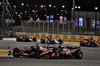 GP BAHRAIN, Lewis Hamilton (GBR) Ferrari SF-25 e Lando Norris (GBR) McLaren MCL39 battle for position.

13.04.2025. Formula 1 World Championship, Rd 4, Bahrain Grand Prix, Sakhir, Bahrain, Gara Day.

- www.xpbimages.com, EMail: requests@xpbimages.com © Copyright: Moy / XPB Images