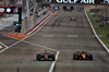 GP BAHRAIN, Charles Leclerc (MON) Ferrari SF-25 e Lando Norris (GBR) McLaren MCL39 battle for position.

13.04.2025. Formula 1 World Championship, Rd 4, Bahrain Grand Prix, Sakhir, Bahrain, Gara Day.

- www.xpbimages.com, EMail: requests@xpbimages.com © Copyright: Moy / XPB Images