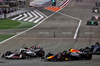 GP BAHRAIN, Oliver Bearman (GBR) Haas VF-25 e Yuki Tsunoda (JPN) Red Bull Racing RB21 battle for position.

13.04.2025. Formula 1 World Championship, Rd 4, Bahrain Grand Prix, Sakhir, Bahrain, Gara Day.

- www.xpbimages.com, EMail: requests@xpbimages.com © Copyright: Batchelor / XPB Images