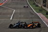 GP BAHRAIN, George Russell (GBR) Mercedes AMG F1 W16 e Lando Norris (GBR) McLaren MCL39 battle for second position at the end of the race.

13.04.2025. Formula 1 World Championship, Rd 4, Bahrain Grand Prix, Sakhir, Bahrain, Gara Day.

- www.xpbimages.com, EMail: requests@xpbimages.com © Copyright: Moy / XPB Images