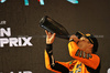 GP BAHRAIN, Lando Norris (GBR) McLaren celebrates his third position on the podium.

13.04.2025. Formula 1 World Championship, Rd 4, Bahrain Grand Prix, Sakhir, Bahrain, Gara Day.

- www.xpbimages.com, EMail: requests@xpbimages.com © Copyright: Bearne / XPB Images