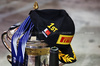 GP BAHRAIN, The cap, medal, e trophy of vincitore Oscar Piastri (AUS) McLaren.

13.04.2025. Formula 1 World Championship, Rd 4, Bahrain Grand Prix, Sakhir, Bahrain, Gara Day.

- www.xpbimages.com, EMail: requests@xpbimages.com © Copyright: Moy / XPB Images