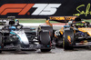 GP BAHRAIN, George Russell (GBR) Mercedes AMG F1 W16 e Lando Norris (GBR) McLaren MCL39 battle for second position at the end of the race.		



13.04.2025. Formula 1 World Championship, Rd 4, Bahrain Grand Prix, Sakhir, Bahrain, Gara Day.

 - www.xpbimages.com, EMail: requests@xpbimages.com © Copyright: Coates / XPB Images