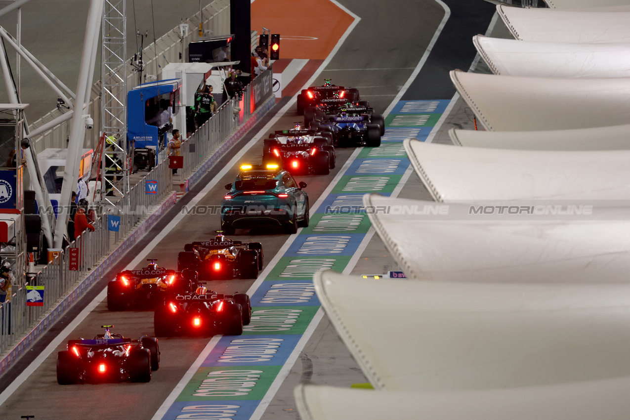 GP BAHRAIN, The Aston Martin FIA Medical Car in the middle of the queue of cars about to leave the pits during qualifying.

12.04.2025. Formula 1 World Championship, Rd 4, Bahrain Grand Prix, Sakhir, Bahrain, Qualifiche Day.

 - www.xpbimages.com, EMail: requests@xpbimages.com © Copyright: Coates / XPB Images