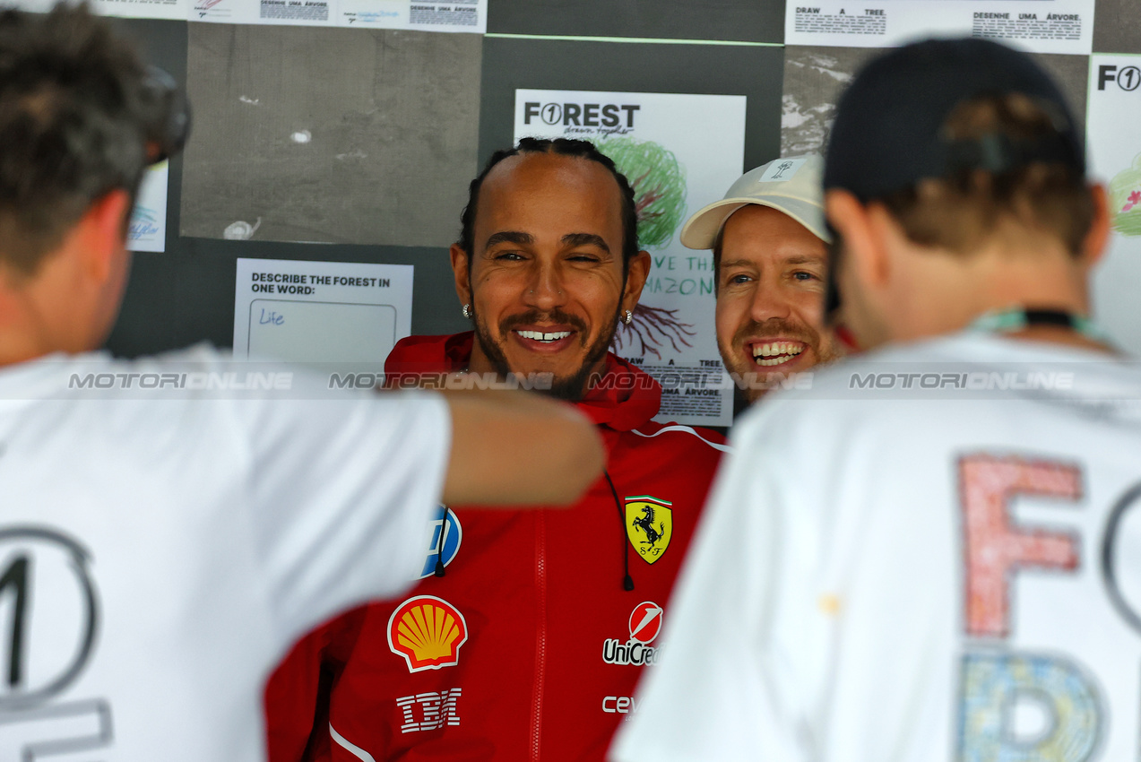 GP BRASILE, (L to R): Lewis Hamilton (GBR) Ferrari e Sebastian Vettel (GER) - F1Rest.

09.11.2025. Formula 1 World Championship, Rd 21, Brazilian Grand Prix, Sao Paulo, Brazil, Gara Day.

- www.xpbimages.com, EMail: requests@xpbimages.com © Copyright: XPB Images
