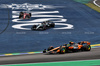 GP BRASILE, Charles Leclerc (MON) Ferrari SF-25 e Andrea Kimi Antonelli (ITA) Mercedes AMG F1 W16 run wide as Lando Norris (GBR) McLaren MCL39 davanti a the race.

09.11.2025. Formula 1 World Championship, Rd 21, Brazilian Grand Prix, Sao Paulo, Brazil, Gara Day.

- www.xpbimages.com, EMail: requests@xpbimages.com © Copyright: Batchelor / XPB Images
