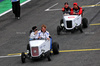 GP BRASILE, (L to R): Isack Hadjar (FRA) Racing Bulls; Liam Lawson (NZL) Racing Bulls; Oliver Bearman (GBR) Haas F1 Team; e Esteban Ocon (FRA) Haas F1 Team, on the drivers' parade.

09.11.2025. Formula 1 World Championship, Rd 21, Brazilian Grand Prix, Sao Paulo, Brazil, Gara Day.

- www.xpbimages.com, EMail: requests@xpbimages.com © Copyright: Batchelor / XPB Images