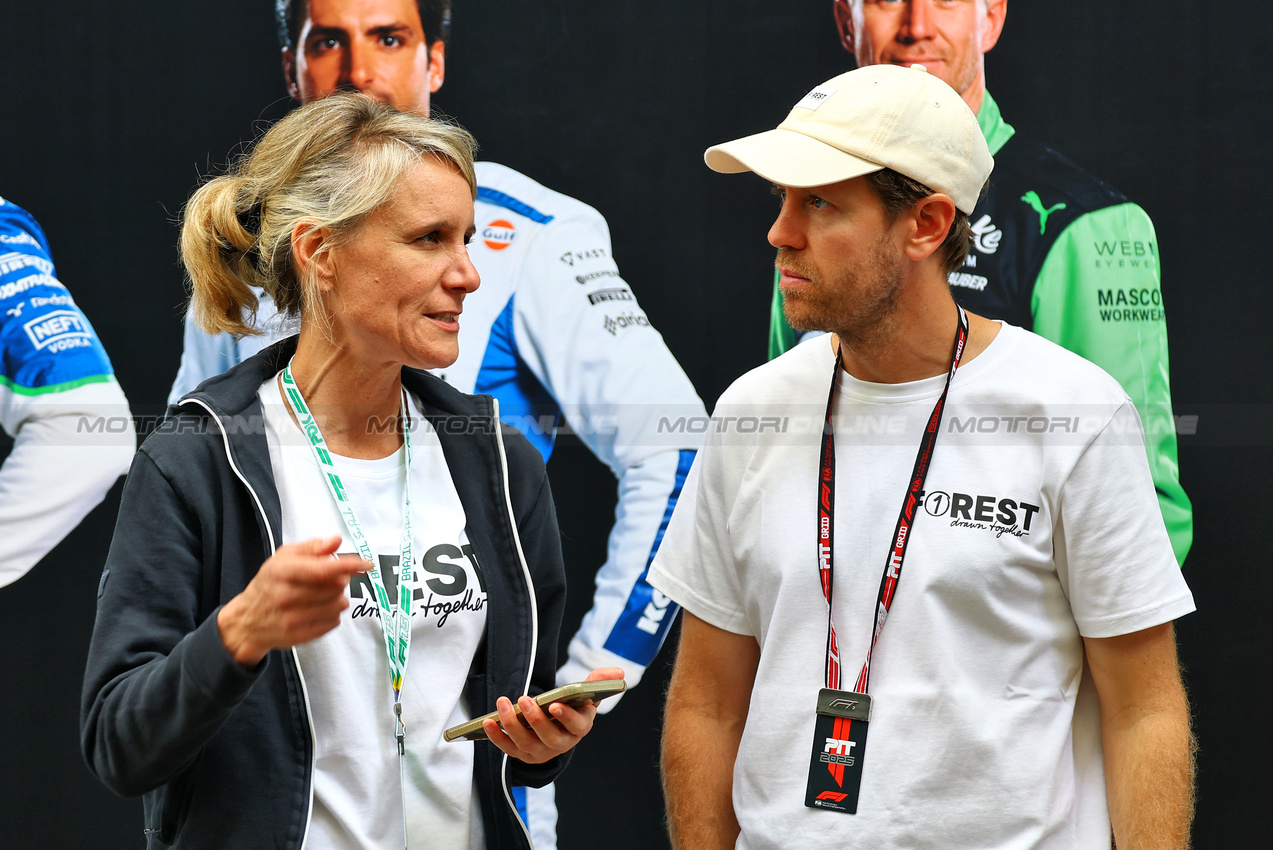 GP BRASILE, (L to R): Britta Roeske (AUT) with Sebastian Vettel (GER).
06.11.2025. Formula 1 World Championship, Rd 21, Brazilian Grand Prix, Sao Paulo, Brazil, Preparation Day.
- www.xpbimages.com, EMail: requests@xpbimages.com © Copyright: XPB Images