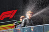 GP CANADA, Gara winner George Russell (GBR) Mercedes AMG F1 celebrates on the podium with second placed Max Verstappen (NLD) Red Bull Racing.

15.06.2025. Formula 1 World Championship, Rd 10, Canadian Grand Prix, Montreal, Canada, Gara Day.

- www.xpbimages.com, EMail: requests@xpbimages.com © Copyright: Bearne / XPB Images