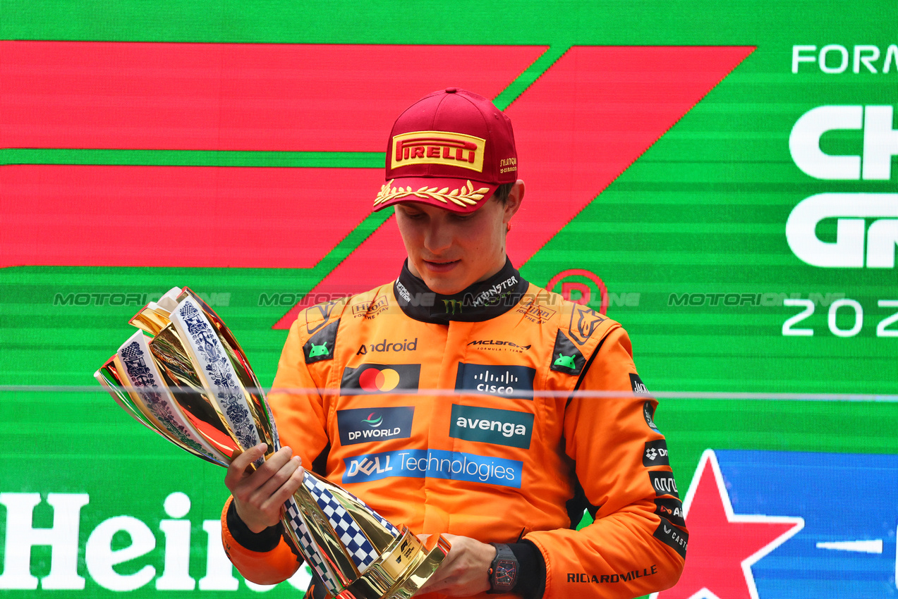 GP CINA, Gara winner Oscar Piastri (AUS) McLaren celebrates on the podium.

23.03.2025. Formula 1 World Championship, Rd 2, Chinese Grand Prix, Shanghai, China, Gara Day.

- www.xpbimages.com, EMail: requests@xpbimages.com © Copyright: Batchelor / XPB Images