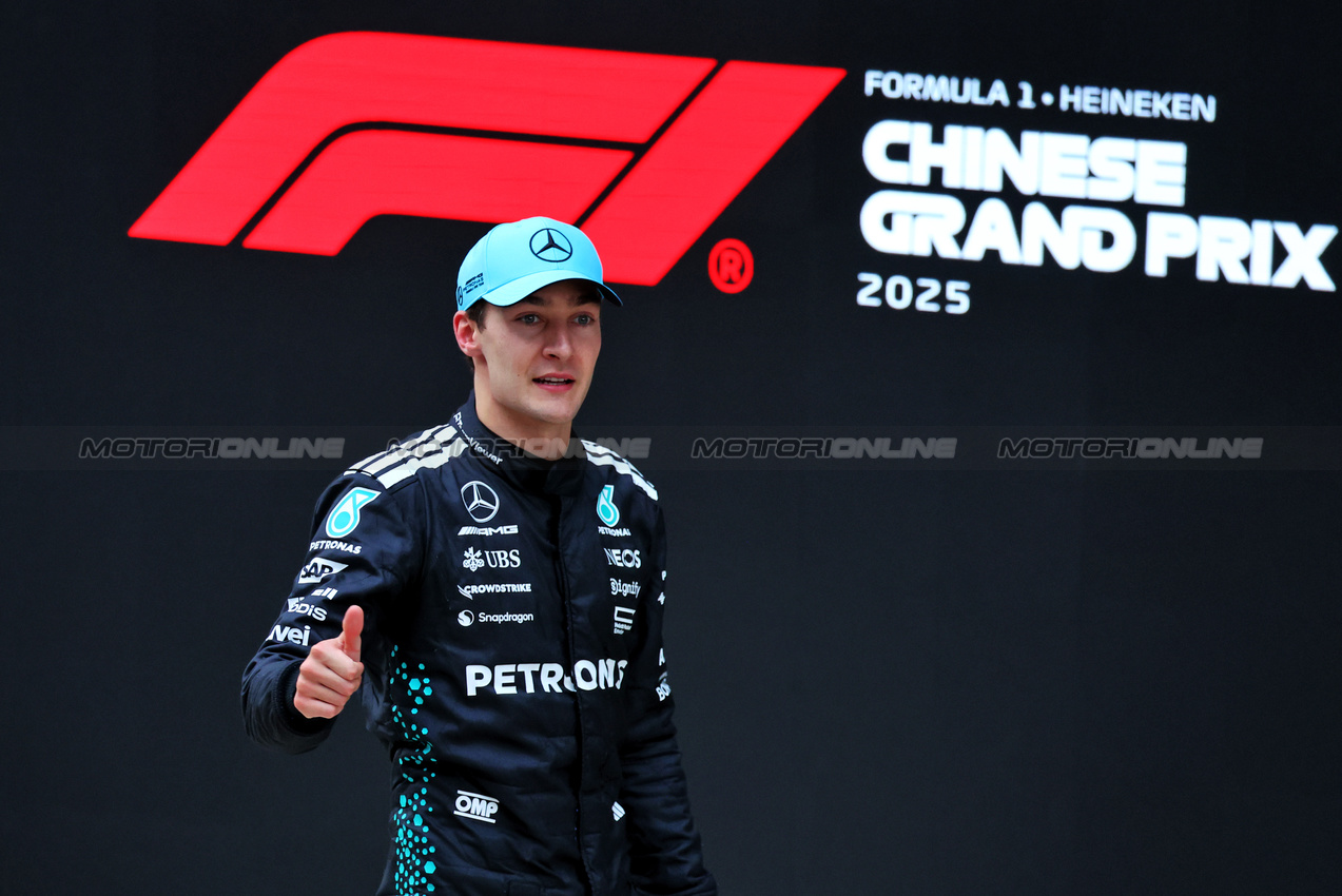 GP CINA, George Russell (GBR) Mercedes AMG F1 celebrates his third position on the podium.

23.03.2025. Formula 1 World Championship, Rd 2, Chinese Grand Prix, Shanghai, China, Gara Day.

- www.xpbimages.com, EMail: requests@xpbimages.com © Copyright: Moy / XPB Images