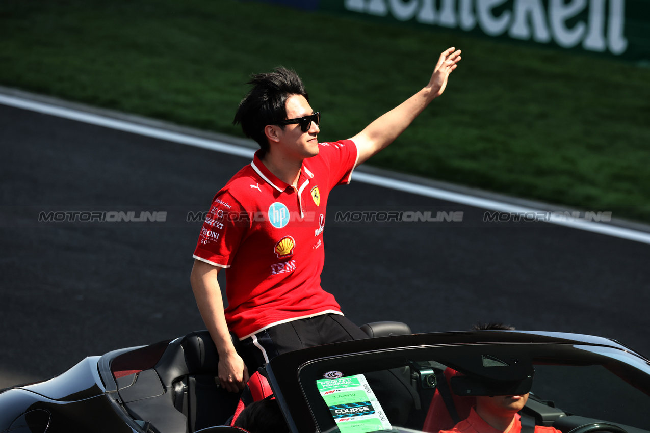 GP CINA, Zhou Guanyu (CHN) Ferrari Reserve Driver on the drivers' parade.

23.03.2025. Formula 1 World Championship, Rd 2, Chinese Grand Prix, Shanghai, China, Gara Day.

- www.xpbimages.com, EMail: requests@xpbimages.com © Copyright: Moy / XPB Images