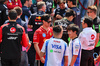GP CINA, Zhou Guanyu (CHN) Ferrari Reserve Driver; Isack Hadjar (FRA) Racing Bulls e Yuki Tsunoda (JPN) Racing Bulls before teams e drivers pay their respects to Eddie Jordan.

23.03.2025. Formula 1 World Championship, Rd 2, Chinese Grand Prix, Shanghai, China, Gara Day.

- www.xpbimages.com, EMail: requests@xpbimages.com © Copyright: Moy / XPB Images