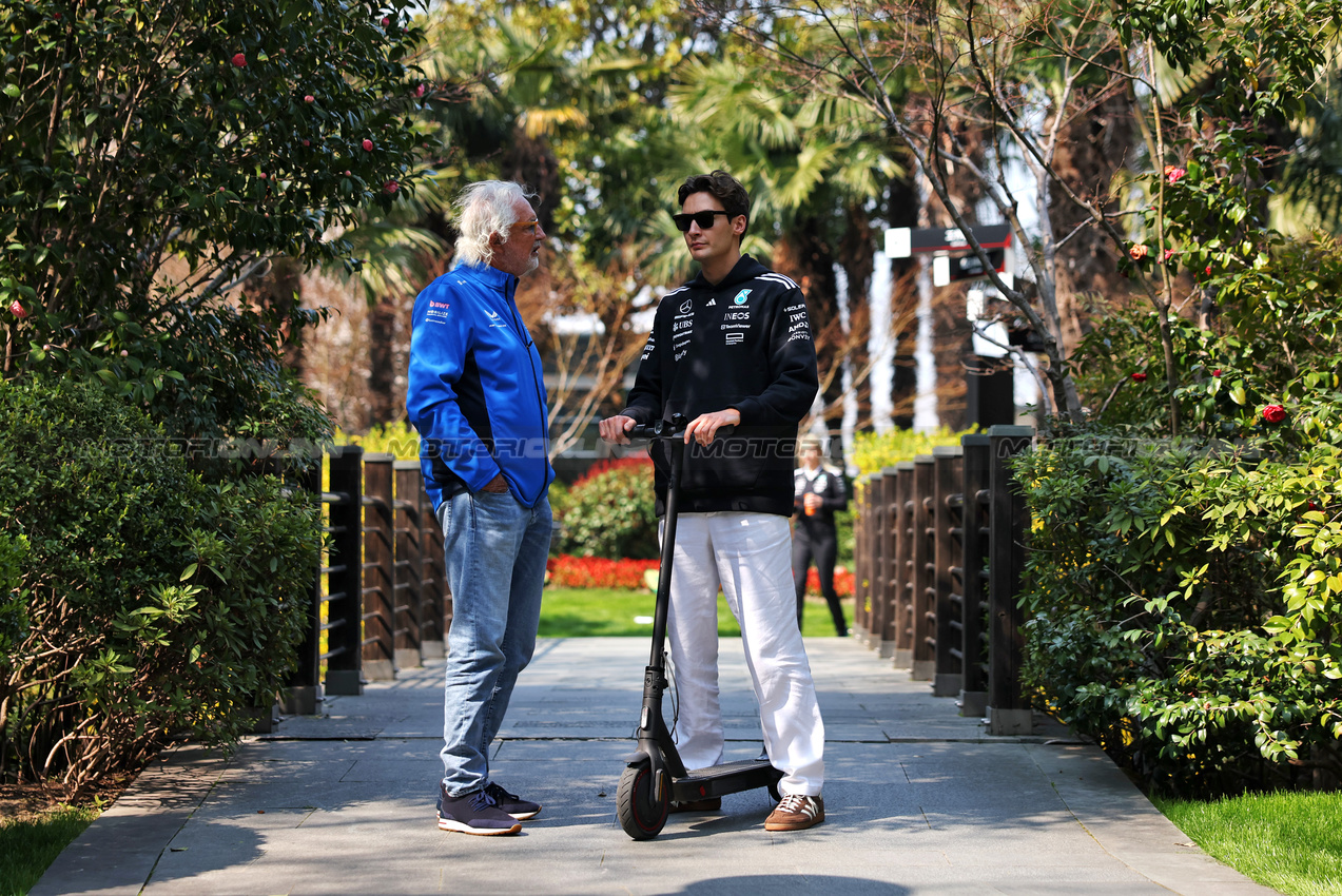 GP CINA, (L to R): Flavio Briatore (ITA) Alpine F1 Team Executive Advisor with George Russell (GBR) Mercedes AMG F1.

20.03.2025. Formula 1 World Championship, Rd 2, Chinese Grand Prix, Shanghai, China, Preparation Day.

- www.xpbimages.com, EMail: requests@xpbimages.com © Copyright: Bearne / XPB Images