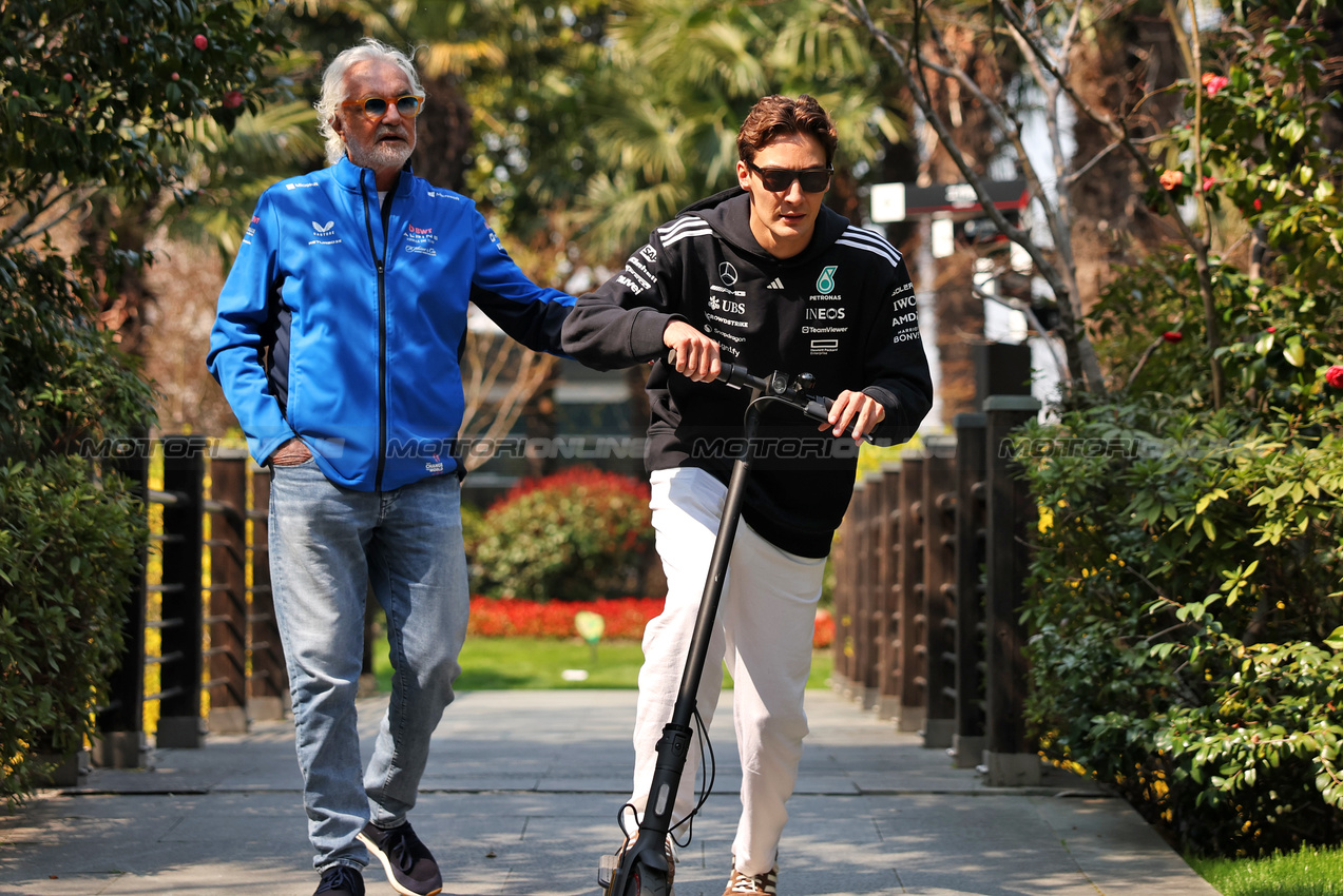 GP CINA, (L to R): Flavio Briatore (ITA) Alpine F1 Team Executive Advisor with George Russell (GBR) Mercedes AMG F1.

20.03.2025. Formula 1 World Championship, Rd 2, Chinese Grand Prix, Shanghai, China, Preparation Day.

- www.xpbimages.com, EMail: requests@xpbimages.com © Copyright: Bearne / XPB Images