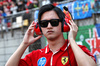 GP CINA, Zhou Guanyu (CHN) Ferrari Reserve Driver on the grid.

22.03.2025. Formula 1 World Championship, Rd 2, Chinese Grand Prix, Shanghai, China, Sprint e Qualifiche Day.

- www.xpbimages.com, EMail: requests@xpbimages.com © Copyright: Moy / XPB Images