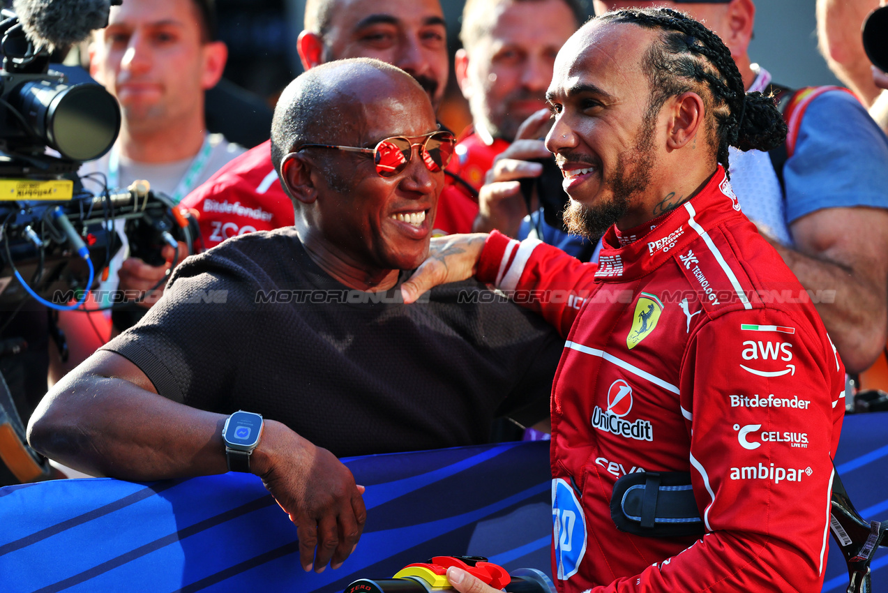 GP CINA, Lewis Hamilton (GBR) Ferrari celebrates pole position in Sprint Qualifiche parc ferme with his father Anthony Hamilton (GBR).

21.03.2025. Formula 1 World Championship, Rd 2, Chinese Grand Prix, Shanghai, China, Sprint Qualifiche Day.

- www.xpbimages.com, EMail: requests@xpbimages.com © Copyright: Batchelor / XPB Images