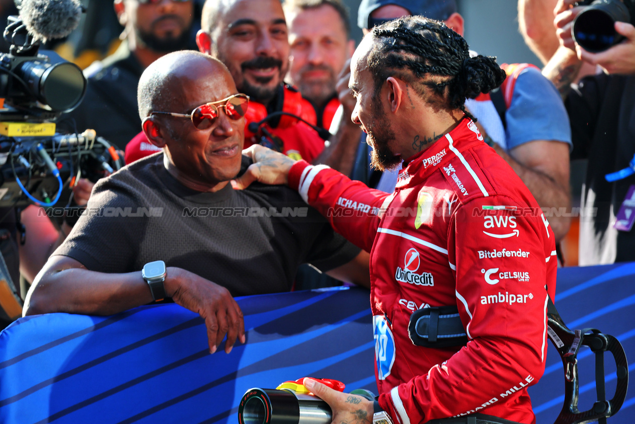 GP CINA, Lewis Hamilton (GBR) Ferrari celebrates pole position in Sprint Qualifiche parc ferme with his father Anthony Hamilton (GBR).

21.03.2025. Formula 1 World Championship, Rd 2, Chinese Grand Prix, Shanghai, China, Sprint Qualifiche Day.

- www.xpbimages.com, EMail: requests@xpbimages.com © Copyright: Batchelor / XPB Images
