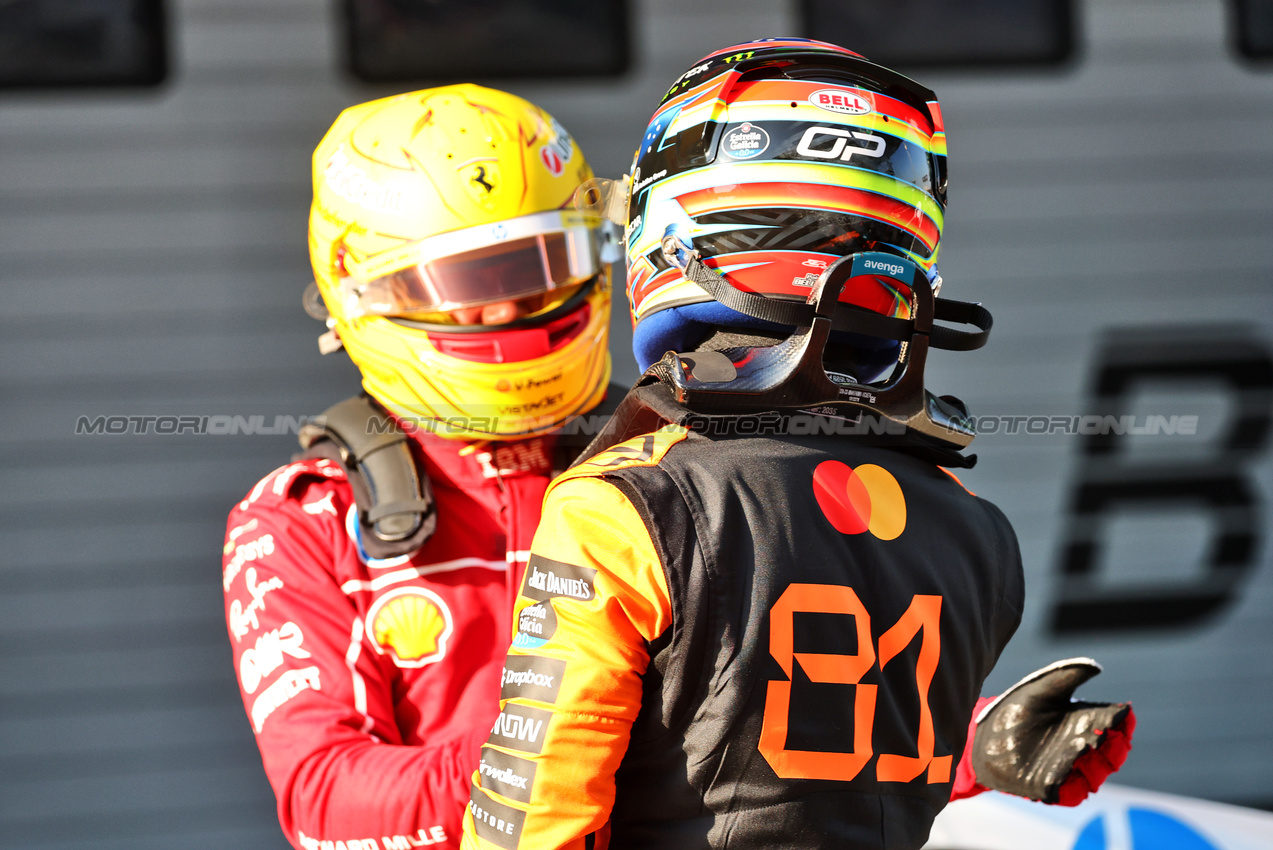 GP CINA, Lewis Hamilton (GBR) Ferrari celebrates his pole position in Sprint Qualifiche parc ferme with Oscar Piastri (AUS) McLaren.

21.03.2025. Formula 1 World Championship, Rd 2, Chinese Grand Prix, Shanghai, China, Sprint Qualifiche Day.

- www.xpbimages.com, EMail: requests@xpbimages.com © Copyright: Batchelor / XPB Images
