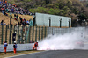 GP GIAPPONE, Marshals put out the grass fire at the entry to 130R which stopped the third practice session.

05.04.2025. Formula 1 World Championship, Rd 3, Japanese Grand Prix, Suzuka, Japan, Qualifiche Day.

- www.xpbimages.com, EMail: requests@xpbimages.com © Copyright: Moy / XPB Images