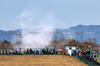 GP GIAPPONE, Smoke from a trackside grass fire that stopped the third practice session.

05.04.2025. Formula 1 World Championship, Rd 3, Japanese Grand Prix, Suzuka, Japan, Qualifiche Day.

- www.xpbimages.com, EMail: requests@xpbimages.com © Copyright: Moy / XPB Images