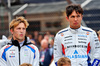 GP GRAN BRETAGNA, (L to R): Liam Lawson (NZL) Racing Bulls e Alexander Albon (THA) Atlassian Williams Racing as the grid observes the national anthem.

06.07.2025. Formula 1 World Championship, Rd 12, British Grand Prix, Silverstone, England, Gara Day.

- www.xpbimages.com, EMail: requests@xpbimages.com © Copyright: Batchelor / XPB Images