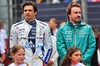 GP GRAN BRETAGNA, (L to R): Carlos Sainz (ESP) Atlassian Williams Racing e Fernando Alonso (ESP) Aston Martin F1 Team as the grid observes the national anthem.

06.07.2025. Formula 1 World Championship, Rd 12, British Grand Prix, Silverstone, England, Gara Day.

- www.xpbimages.com, EMail: requests@xpbimages.com © Copyright: Batchelor / XPB Images