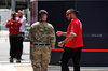 GP GRAN BRETAGNA, Lewis Hamilton (GBR) Ferrari with a soldier.

03.07.2025. Formula 1 World Championship, Rd 12, British Grand Prix, Silverstone, England, Preparation Day.

- www.xpbimages.com, EMail: requests@xpbimages.com © Copyright: Davenport / XPB Images