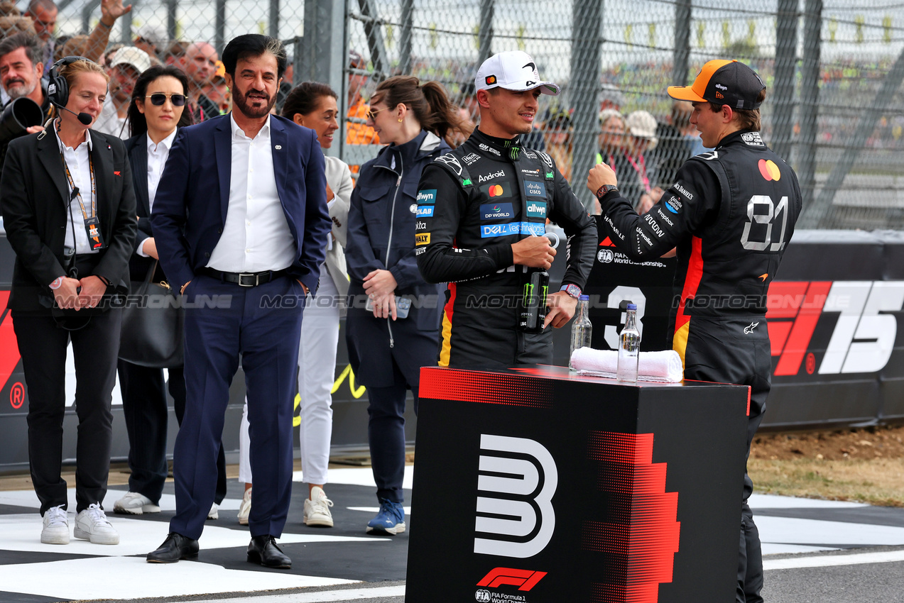 GP GRAN BRETAGNA, (L to R): Mohammed Bin Sulayem (UAE) FIA President with Lando Norris (GBR) McLaren e Oscar Piastri (AUS) McLaren in qualifying parc ferme.

05.07.2025. Formula 1 World Championship, Rd 12, British Grand Prix, Silverstone, England, Qualifiche Day.

- www.xpbimages.com, EMail: requests@xpbimages.com © Copyright: Moy / XPB Images